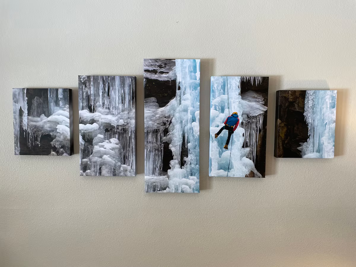 Five-panel canvas print of frozen waterfalls with a climber on the ice
